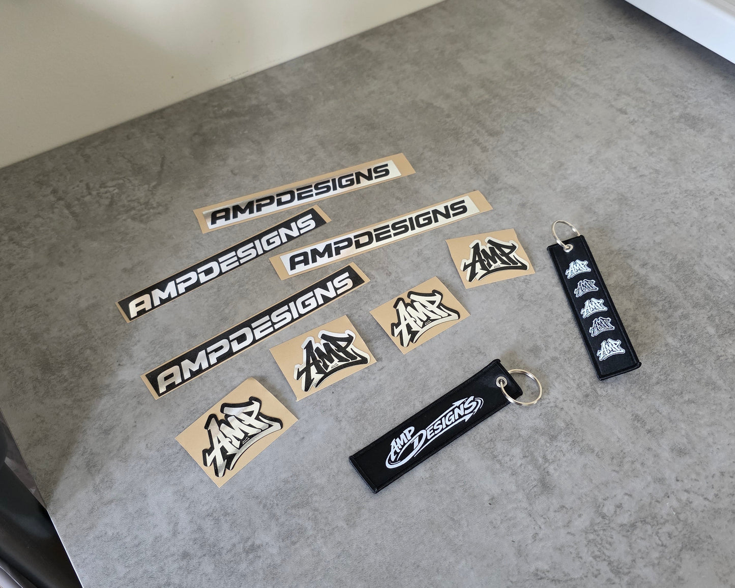 AMP DESIGNS Sticker and Jet Tag Combo