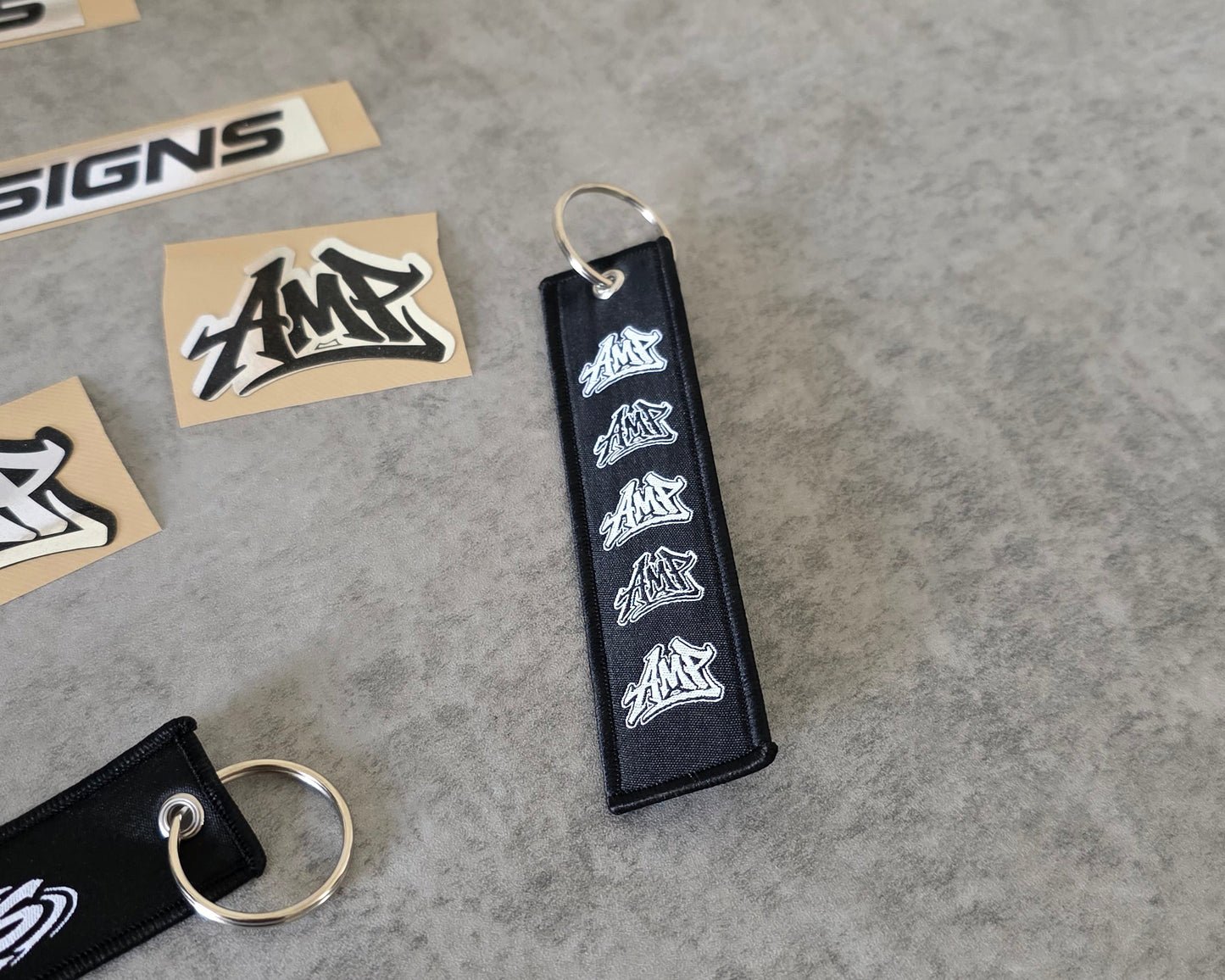 AMP DESIGNS Sticker and Jet Tag Combo